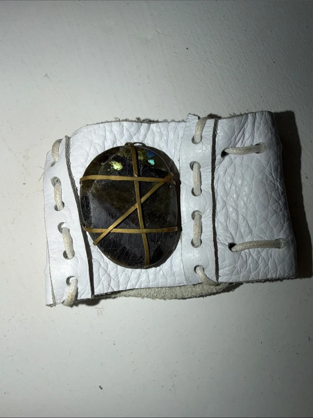 White Leather Wristband Cuff with Dark Stone Accent